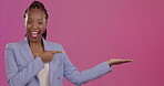 Portrait, branding and a business black woman pointing to blank mockup space for product placement. Advertising, marketing and promotion with a female employee in studio on a mock up pink background