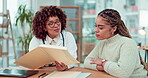 Woman doctor consulting patient with document or folder for happy results, good news and healthcare paperwork advice. Biracial person, medical professional and gynecology health support or discussion