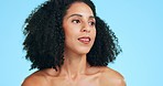 Beauty, skincare and face of black woman for wellness, hair care and facial treatment on blue background. Dermatology, luxury spa and confident girl in studio for cosmetics, makeup and satisfaction