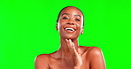 Black woman, beauty and hand on face on a green screen for skincare, cosmetics and dermatology. Portrait of aesthetic female model in studio for facial, self care and smooth skin glow with a smile
