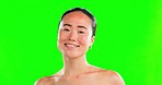 Beauty, skincare and smile with asian woman in studio for cosmetics, pride and natural. Self care, glow and spa with portrait of model on green screen background for positive, facial and elegant