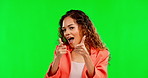 Pointing, excited and dance with woman in green screen studio for motivation, support and choice. Achievement, winner and direction with female isolated on background for funny, selection and you