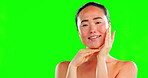 Beauty, hand on face and asian woman on green screen background for skincare, dermatology and cosmetic. Aesthetic female model portrait with spa facial or self care glow on skin with mockup in studio