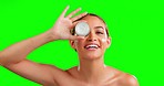 Face cream, skincare and woman in studio with skin, product and beauty routine on green screen background. Portrait, sunscreen and girl relax, smile and happy with dermatology, cosmetics and facial