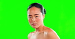 Asian woman, face and skincare on green screen, mockup or chromakey against a studio background. Portrait of confident female beauty model posing for luxury body care and satisfaction for self love