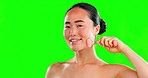 Skincare, face and beauty of Asian woman with roller on green screen in studio isolated on a background mockup. Dermatology, portrait and happy female model with rose quartz for facial skin treatment
