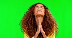 Hope, praying and woman in studio with excited, nervous and anxiety on green background. Winner mockup, giveaway and portrait of girl with prayer hands waiting for winning, success or prize bonus