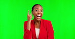 Thinking, wow and eureka with a black woman on a green screen background in studio feeling excited. Portrait, idea and surprise with an attractive young female looking happy while laughing