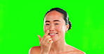 Beauty, face cream and asian woman portrait on green screen background for skincare. Happy aesthetic female model with spa facial or self care glow on skin with mockup dermatology product in studio