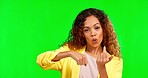 Woman, studio and middle finger while mad by green screen, frustrated or angry expression in mockup. Girl, young model and rolling fuck you hands for anger, portrait or mock up with sign for conflict