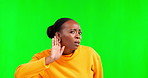 Hear, listening and a black woman on a green screen background in studio thinking about news or gossip. Hand gesture, sound and attention with a female trying to listen to a rumor on chromakey