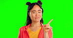 No, finger and stop with asian woman in green screen studio for warning, rejection and opinion. Negative, serious and disagreement with female on background for attention, danger and frustrated