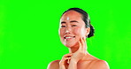 Skincare, face smile and Asian woman with cream on green screen in studio isolated on a background. Beauty dermatology, cosmetics portrait and happy female model with product, lotion or moisturizer.