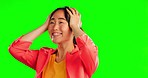 Wow, surprise and Asian woman in shock on a green screen isolated on a studio background. Happy, mockup and a Japanese girl with an expression of amazement, excitement and good news with space