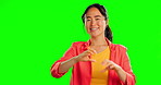 Portrait, love and sign language with as asian woman on a green screen background in studio making a heart gesture. Hands, happy and emoji with an attractive young female posing on chromakey mockup