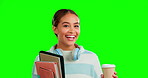 Books, coffee and headphones with a woman on a green screen background in studio for education. Portrait, student and scholarship with an attractive young female feeling happy on chromakey mockup
