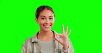 Woman, ok hand sign and green screen with face, smile or excited in studio for happiness by background. Model girl, happy or mockup portrait for emoji, icon or gesture for agreement, approval or vote