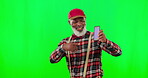 Dance, phone screen and mockup with black man pointing in green screen studio for website, text message and social media. Celebration, happy and excited with senior male on background for technology