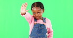 Stop, green screen and child with angry hand gesture for authority isolated against a studio background. Girl, frustrated and serious kid with a problem and no sign, signal and warning expression