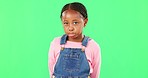 Sad, expression and face of a child on a green screen isolated on a studio background. Depression, unhappy and portrait of an African girl kid looking moody, disappointed and expressing sadness