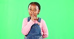 Face, secret and black girl with finger on lips, silence and happiness against studio background. Portrait, African American female child and young person with gesture for quiet, kid and green screen
