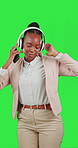 Black woman, dancing with smartphone and headphones on green screen, listen to music with fun and rhythm. Professional female with online streaming, tech and radio with freedom on studio background