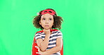 Green screen, superhero and child thinking of idea to stop crime and fight with fantasy or cosplay costume. Girl power, hero and pretend game with strong kid to protect freedom and justice with space