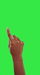 Finger, click and swipe on a green screen background with a hand in studio to press an interactive touchscreen button. Dashboard, app and tech with a user touching a virtual interface on chromakey