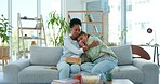 Black woman, friends and cry on sofa in support, care or understanding together at home. Sad African women with supportive friend crying on shoulder in living room couch for grief, emotion or loss