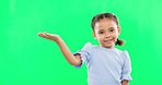Green screen, hand gesture and child face of a young girl with mock up showing advertisement or product. Portrait, smile and happiness of a little kid with isolated studio background with mockup