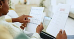 Black couple, hands and laptop with documents for mortgage, expenses or schedule payments at home. Hand of African American man and woman reading bills, paperwork or finance on living room sofa