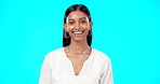 Face, laughing and business woman in studio isolated on blue background. Boss, professional and happy, funny and confident female entrepreneur from India with pride for career, job or success mindset