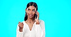 Phone call, business woman and studio with a Indian female talking, networking and speaking. Mobile communication, online discussion and tech network of a young person with isolated blue background