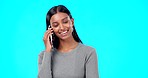 Happy, woman and phone call communication on blue background, studio and backdrop for contact. Indian female, model and talking on smartphone with smile, conversation and mobile networking discussion