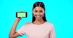 Chromakey, green screen and portrait of woman holding phone for product place, logo and mobile app advertising. Smile, happy and professional female isolated in a studio blue background