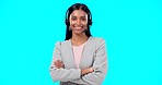 Call center, portrait or Indian woman in studio for communication isolated on blue background. Face smile, mockup or friendly girl in headset helping at technical support, telecom or customer service