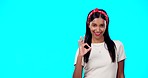 Okay gesture, studio and happy woman point at sales promo, present gift or discount deal mockup. Female portrait, good advertising space and marketing product placement for person on blue background