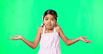 Portrait, happy and a girl shrugging on a green screen background in studio to gesture doubt or whatever. Smile, question and confused with an adorable little female child on chromakey mockup
