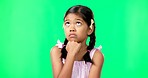 Kid, eye roll and annoyed girl with a green screen in a studio feeling bored while thinking. Think, young child and casual fashion of a student waiting, tired and isolated with youth while frustrated