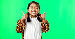 Children, portrait and thumbs up with a girl on a green screen background in studio saying yes in agreement. Kids, hand gesture and emoji with an adorable little female child on chromakey mockup