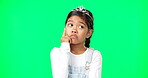 Thinking, green screen and child wondering with a question feeling confused, thoughtful and isolated in studio background. Planning, girl and kid contemplating, curious and planning expression