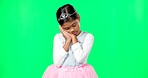 Sleeping, tired gesture and child on green screen with crown, princess costume and tutu in studio. Sadness, sleepy mockup and isolated young girl with fatigued, dreaming and nap expression for rest