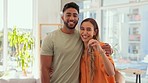 Keys, face and couple moving into new house together, happy and excited for beginning on blurred background. Portrait, love and man with woman embrace in living room, cheerful and smile in their home