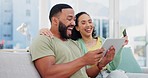 Laughing, paying and a couple with a tablet and credit card for banking, ecommerce and online shopping. Happy, buying and a man and woman speaking about an order on an app, purchase and bills