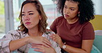 Sad, depression and friend comforting a woman after a breakup, divorce or heartbreak. Crying, care and girl showing support, comfort and love during grief, loss or relationship fail together