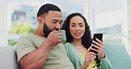 Couple, phone and talking with coffee on home sofa for streaming or watch movies on internet. Black man and woman together on couch with smartphone for online shopping or laughing at funny meme video