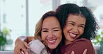 Love, diversity and women hugging on sofa with smile, happiness and solidarity in friendship and pride. Lesbian couple, woman and friend in happy embrace for support and trust together in living room