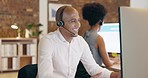 Call center, man and talking on computer for support, customer service help and crm consulting in office. Happy telemarketing agent, male consultant and desktop advisor for telecom questions at night