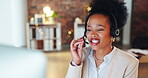 Black woman, call center and talking to client with CRM, customer support or telemarketing night shift. Communication, headset and female consultant work late, help desk with computer and contact us