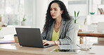 Thinking, working and a woman typing on a laptop for email, communication and online feedback. Serious, business and a corporate employee with a computer for a proposal and internet response